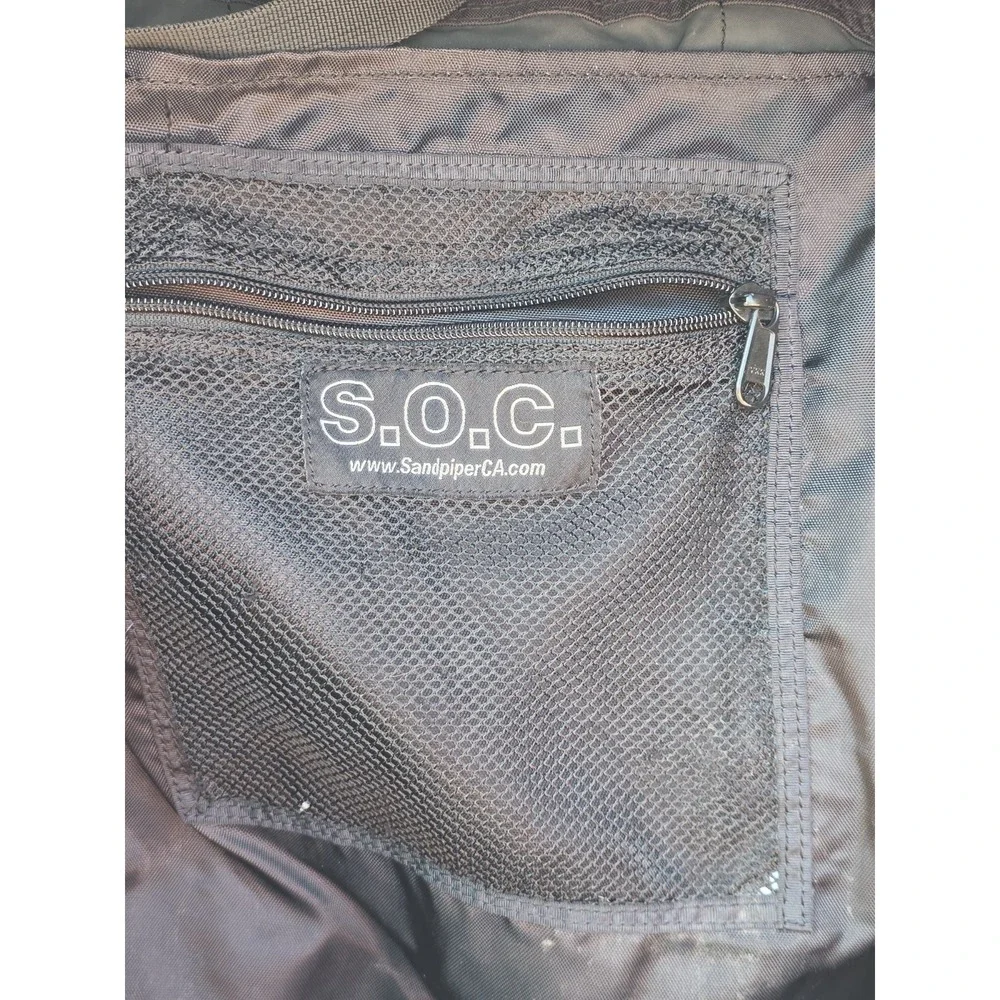 black tactical backpack is a Sandpiper of California Bugout Bag **see Pics**